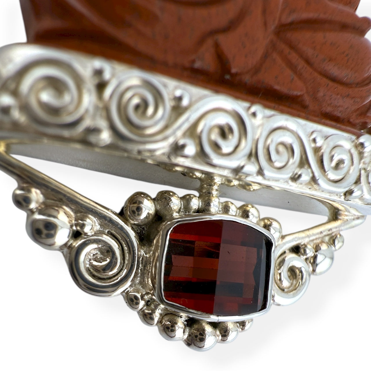 Intricately Carved Red Jasper Ganesha Pendant by Sajen, Accented with Faceted Garnets & 925 Sterling Silver